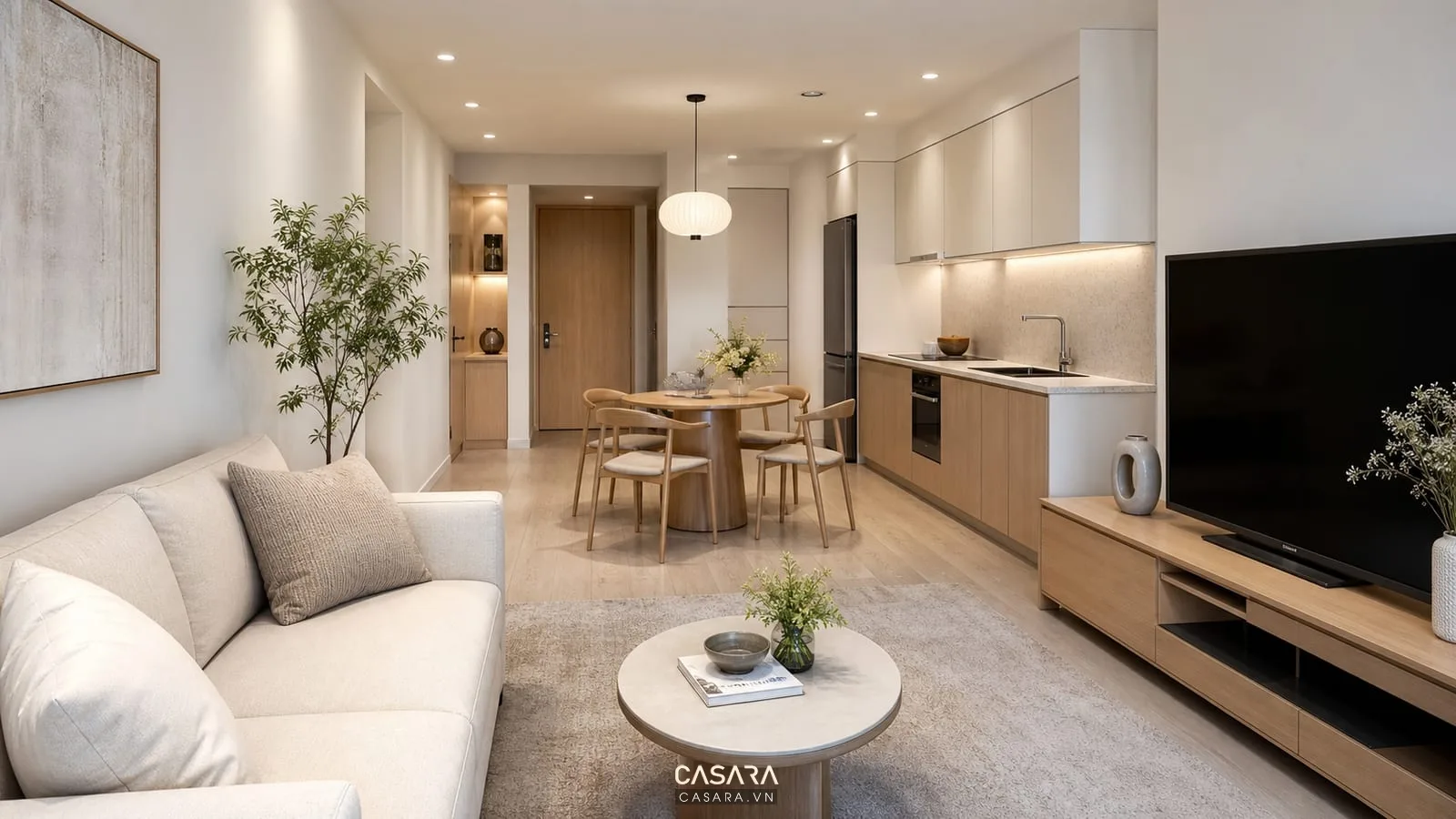 phòng khách căn hộ 45m2 có sofa văng kệ tivi thấp bàn ăn tròn và bếp chữ I