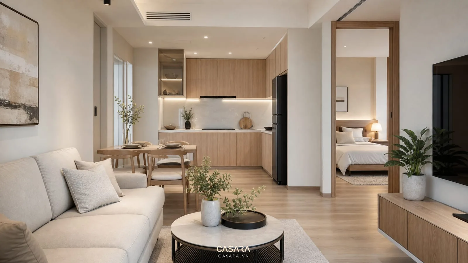 Căn hộ IA20 Ciputra với phòng khách bếp mở sofa trung tính tủ bếp gỗ sáng và ánh sáng tự nhiên