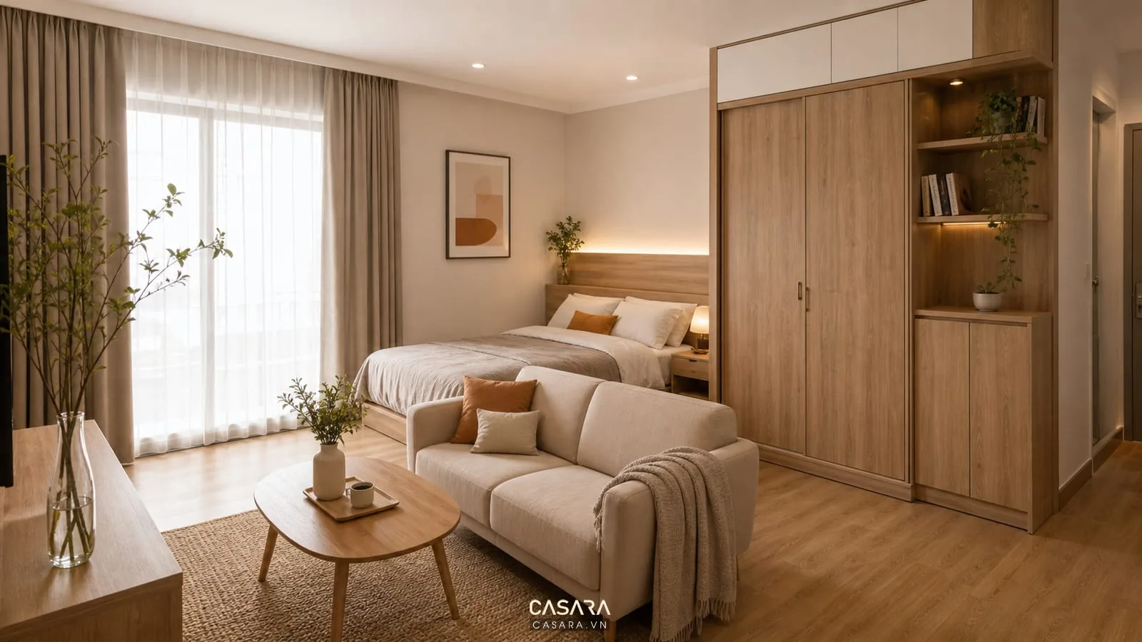 Căn hộ studio trong thiết kế chung cư 30m2 với ánh sáng ấm, sofa nhỏ, giường và tủ gỗ sáng