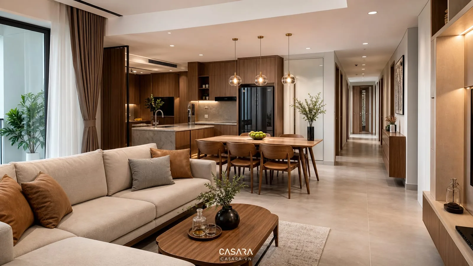 Phòng khách bếp ăn chung cư 3pn với sofa, bàn ăn và lối đi vào khu phòng ngủ