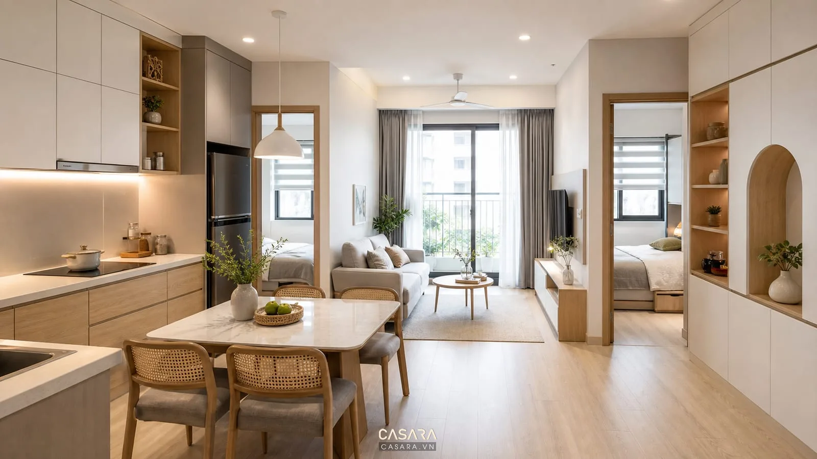 Thiết kế chung cư 50m2 2 phòng ngủ với phòng khách liền bếp bàn ăn gọn sofa sáng màu và tủ lưu trữ âm tường