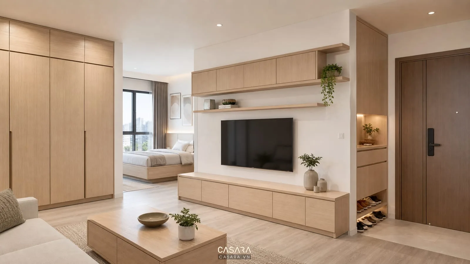 Hệ tủ trong thiết kế chung cư 60m gồm tủ áo tủ tivi và tủ giày màu gỗ sáng
