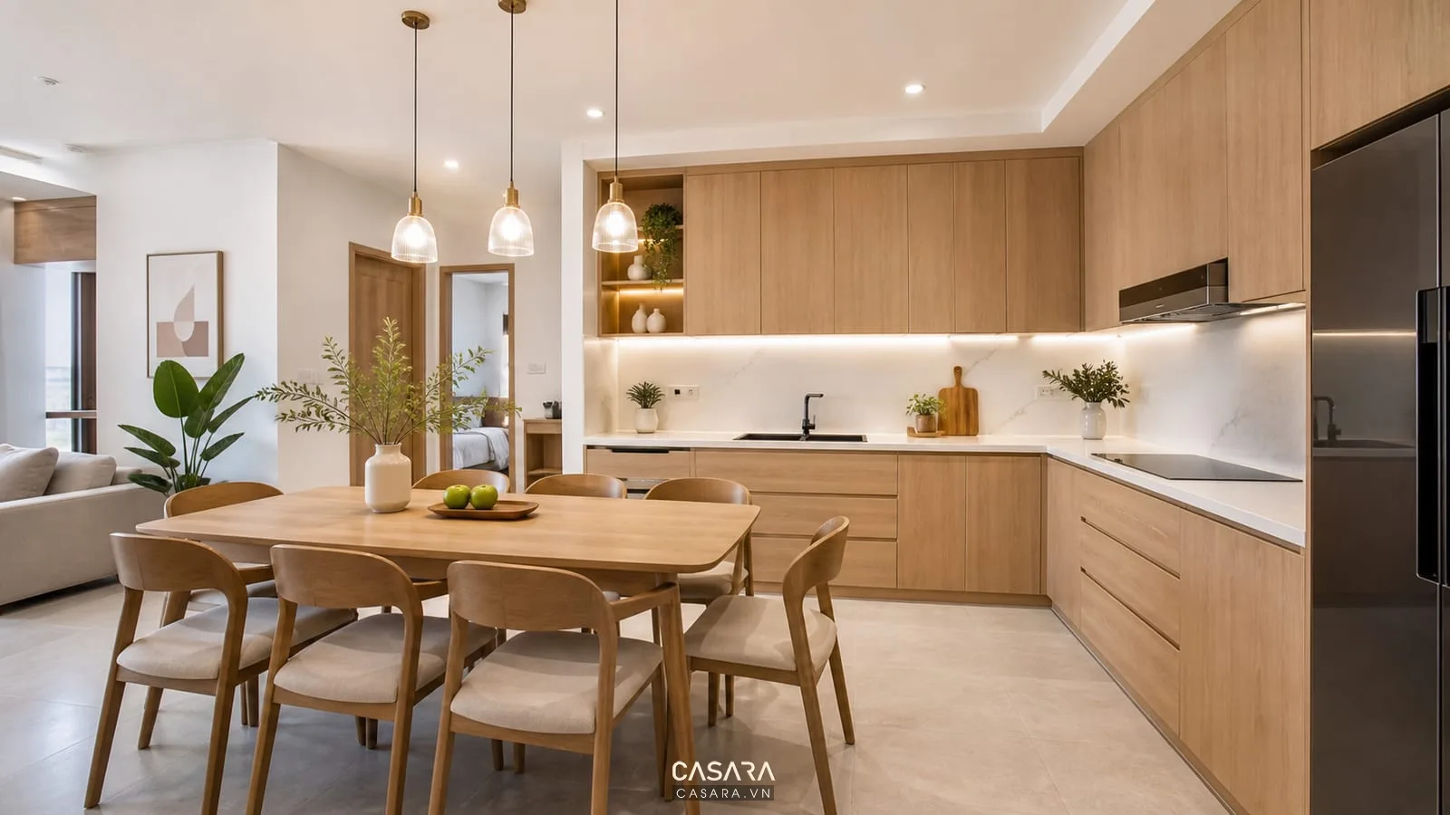 Bếp bàn ăn chung cư 90m2 3 phòng ngủ với tủ bếp chữ L và bàn ăn sáu ghế