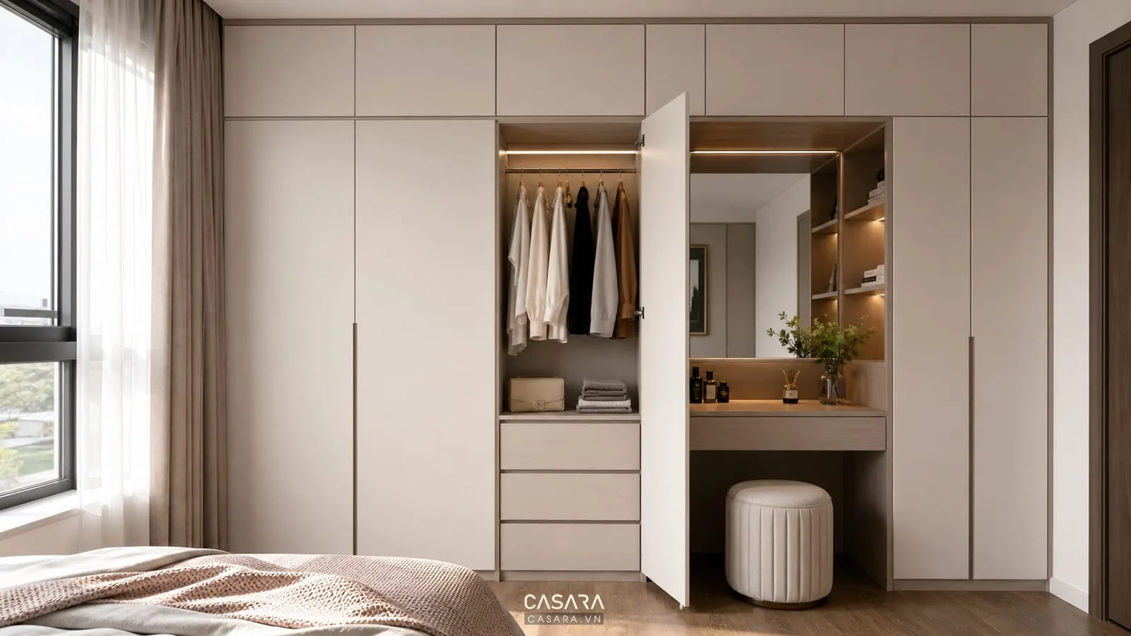 Hệ tủ quần áo trong thiết kế chung cư Eco Dream có ngăn kéo khoang treo và bàn trang điểm liền tủ