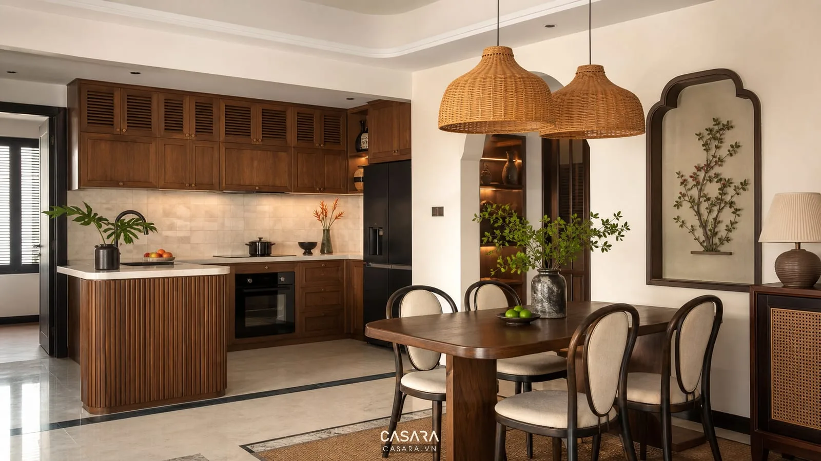Bếp chung cư Indochine với tủ gỗ và bàn ăn có đèn thả mây