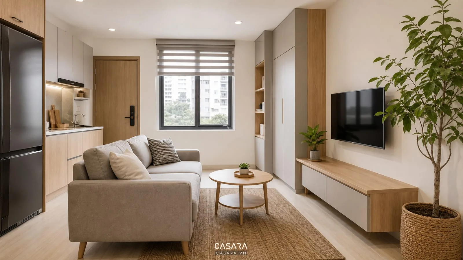 Phòng sinh hoạt chung chung cư mini 25m2 với sofa nhỏ, kệ tivi mỏng, bàn tròn và tủ lưu trữ phẳng