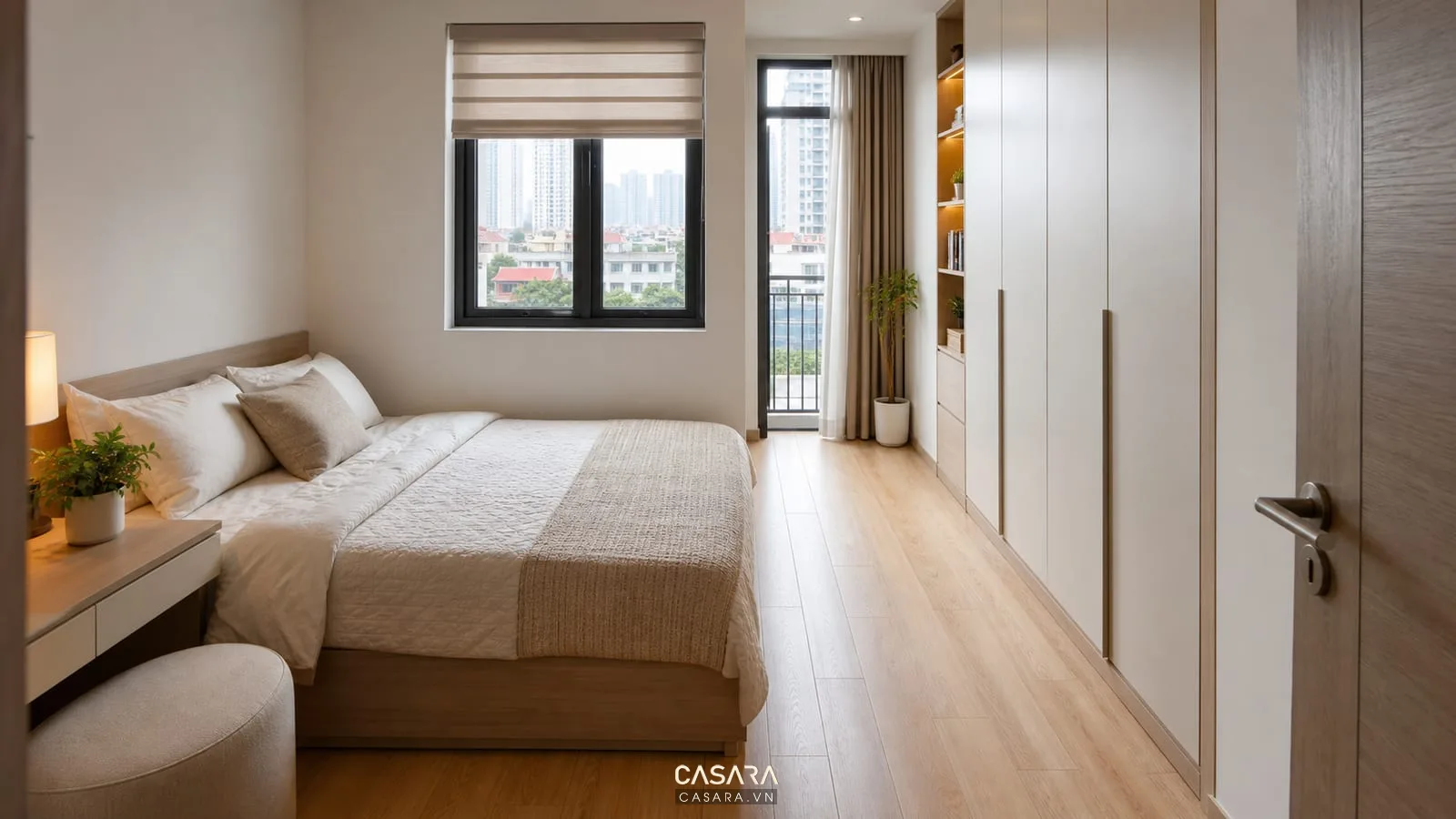 Phòng ngủ chung cư mini 30m2 có giường sát tường tủ áo âm tường và lối đi thoáng
