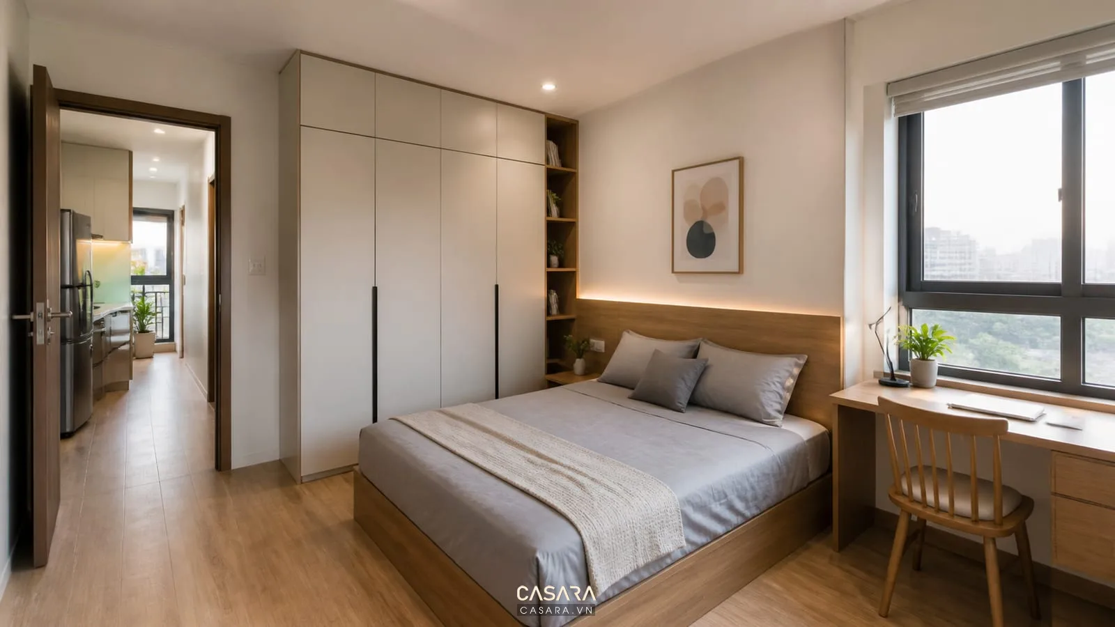 Phòng ngủ thiết kế chung cư mini 50m2 có giường đôi tủ áo kịch trần và lối đi thoáng