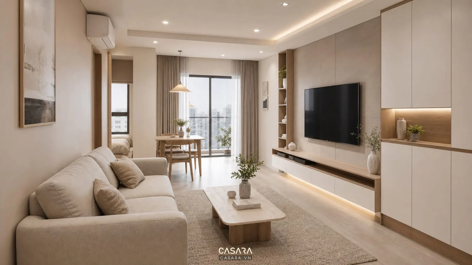Phòng khách chung cư nhỏ đẹp với sofa thấp vách tivi phẳng tủ treo bàn trà nhỏ và ánh sáng ấm