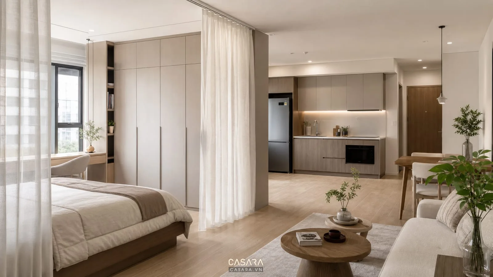 Thiết kế chung cư studio với giường ngủ, rèm phân vùng và bàn làm việc nhỏ