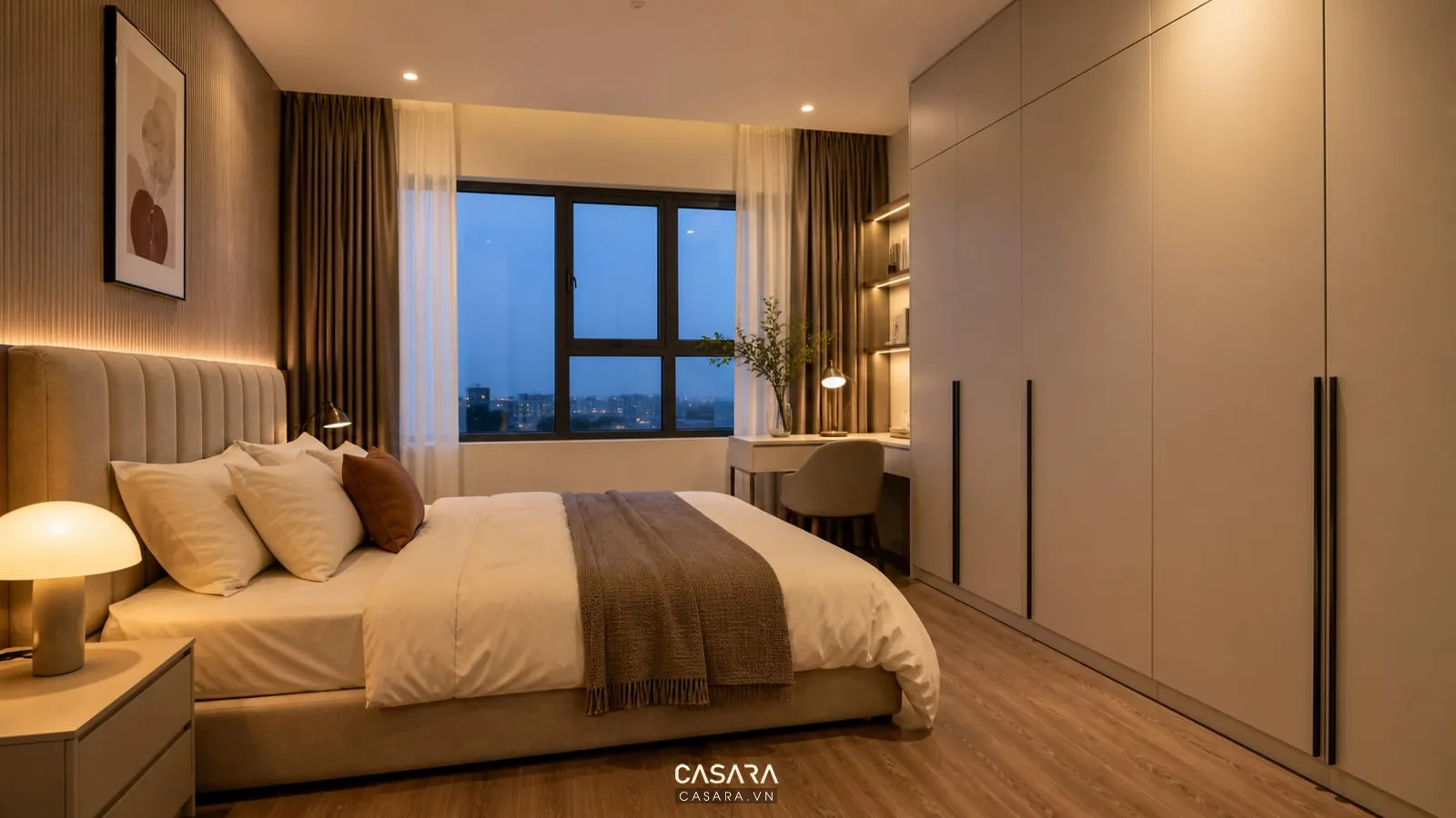 Phòng ngủ trong thiết kế chung cư Victoria Văn Phú với tủ áo và bàn làm việc nhỏ