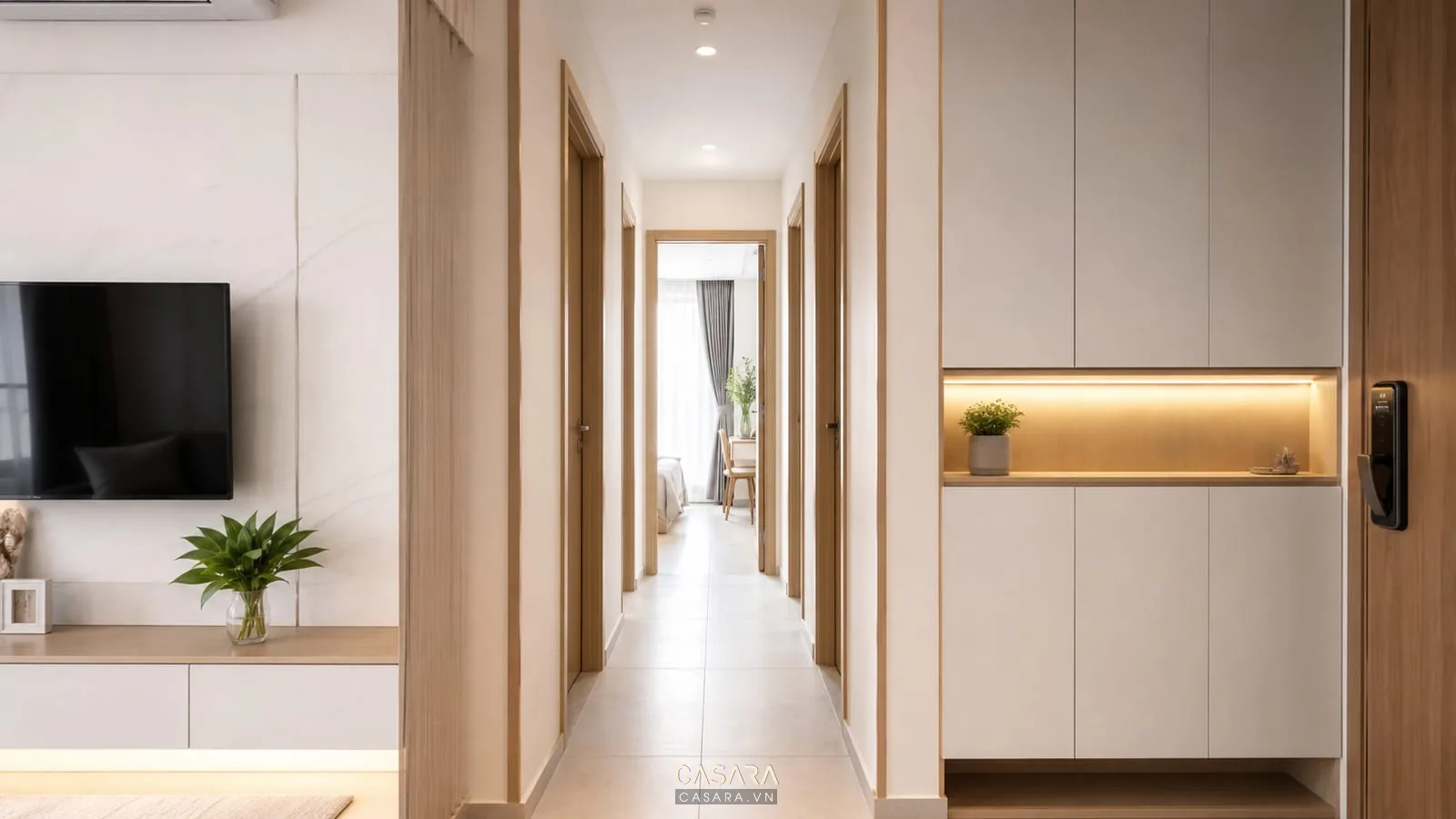 thiết kế chung cư nhỏ với hành lang hẹp sáng và tủ âm gọn gàng