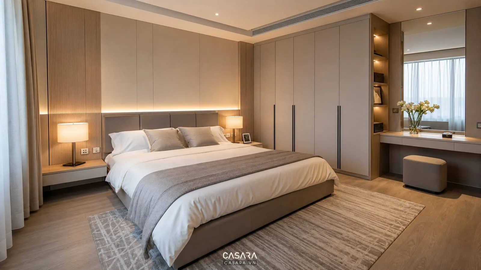 phòng ngủ master thiết kế nội thất chung cư 130m2 với giường tủ áo bàn trang điểm và đèn đầu giường