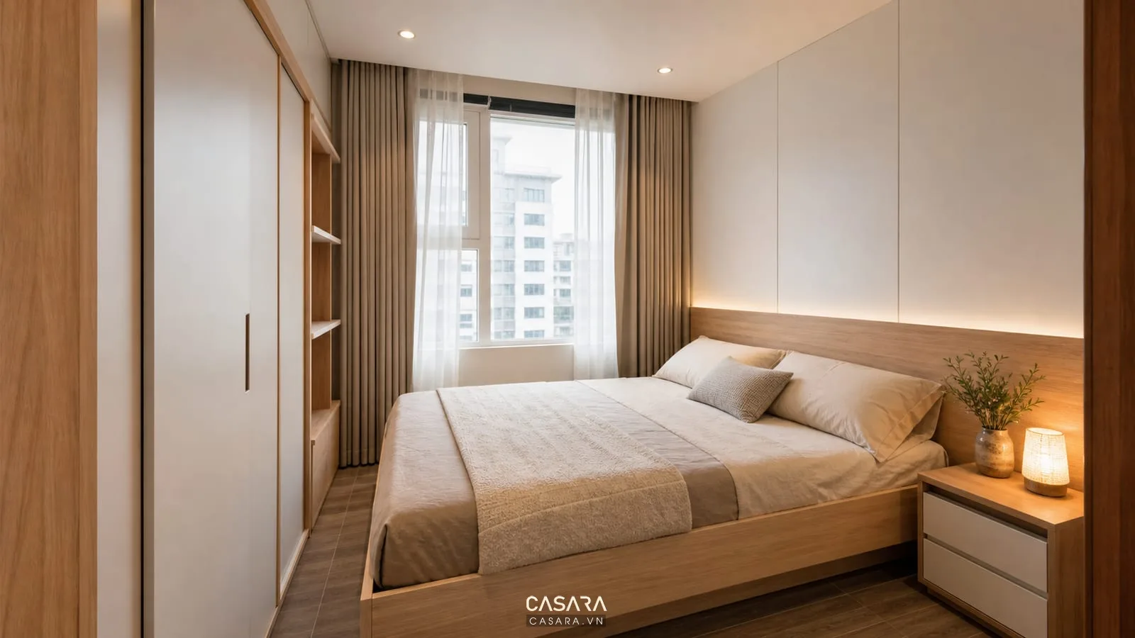 Phòng ngủ trong căn hộ chung cư 45m2 với tủ áo âm tường