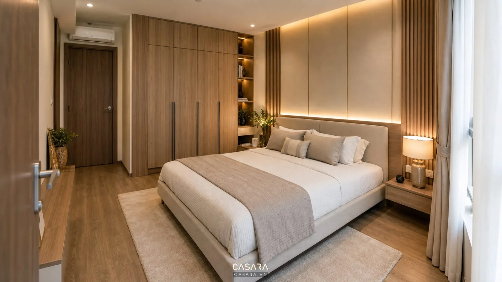 Phòng ngủ chính trong căn hộ chung cư 57m2 với giường và tủ áo gọn