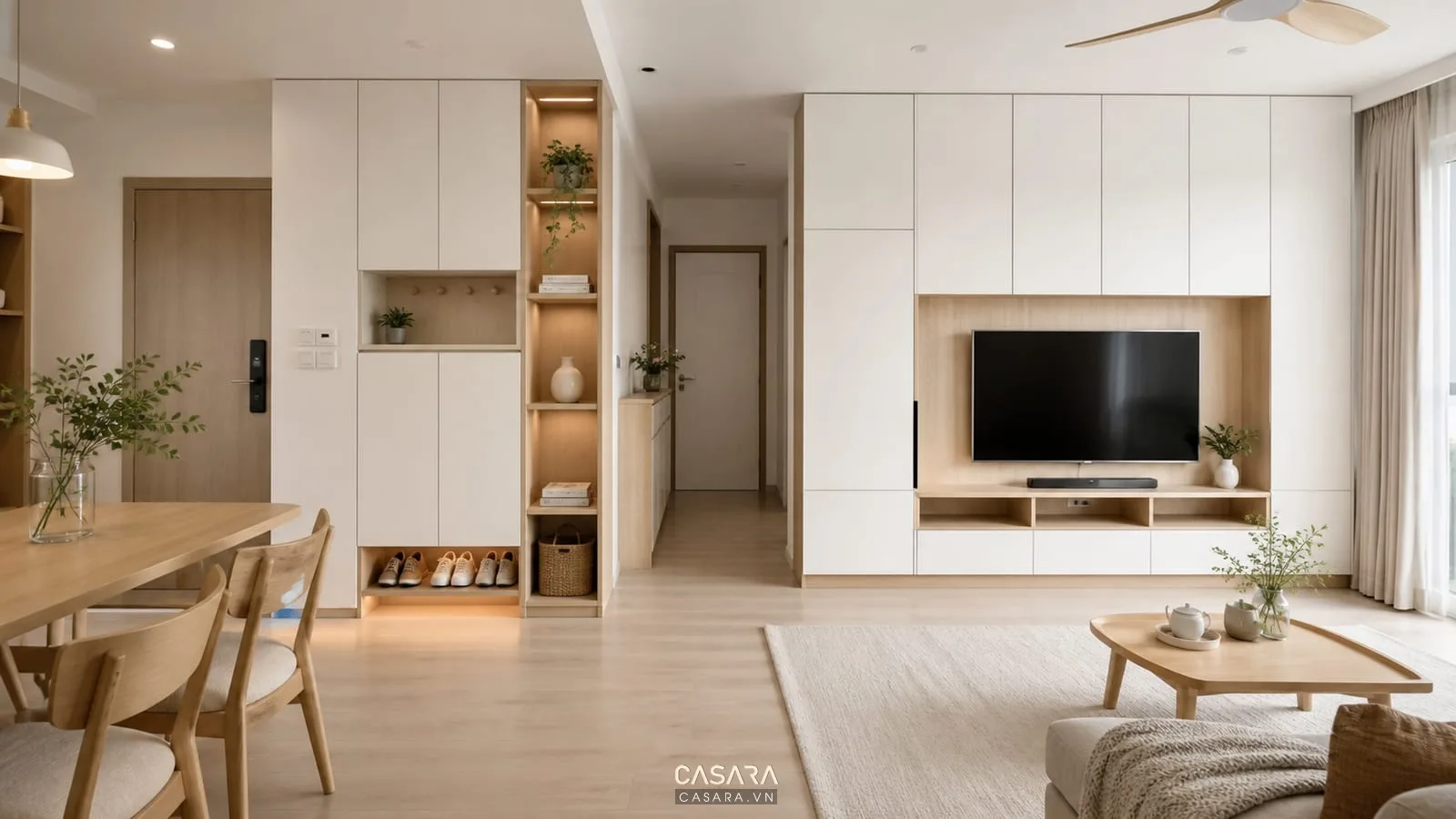 Hệ tủ lưu trữ trong thiết kế nội thất chung cư scandinavian gồm tủ giày, kệ tivi và tủ áo âm tường