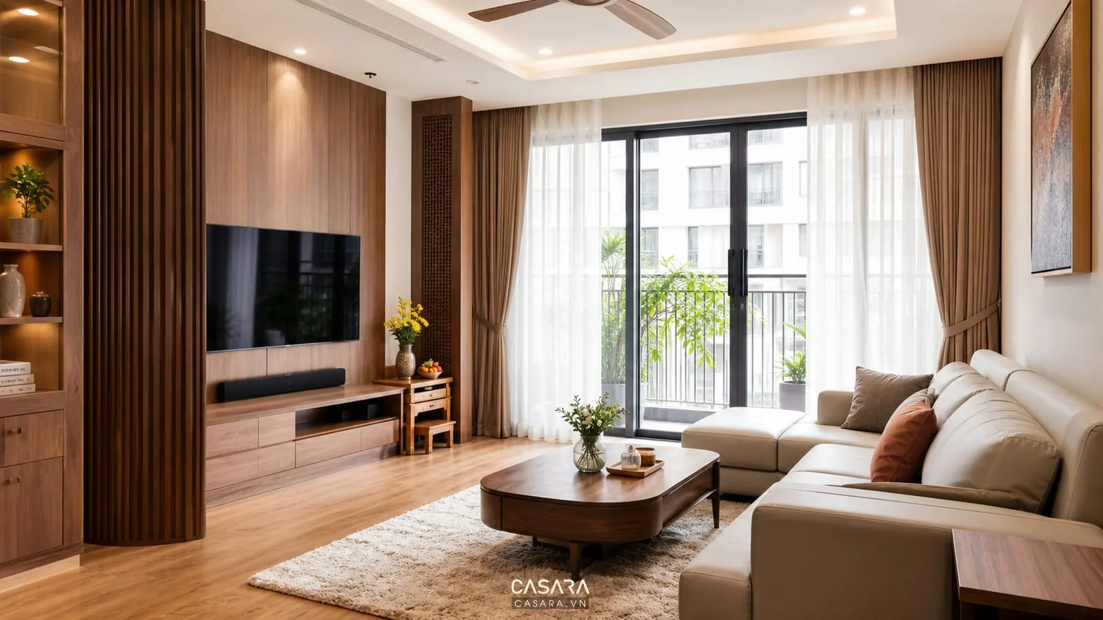 phòng khách trong thiết kế nội thất chung cư The Charm An Hưng với sofa kệ tivi và ban công sáng