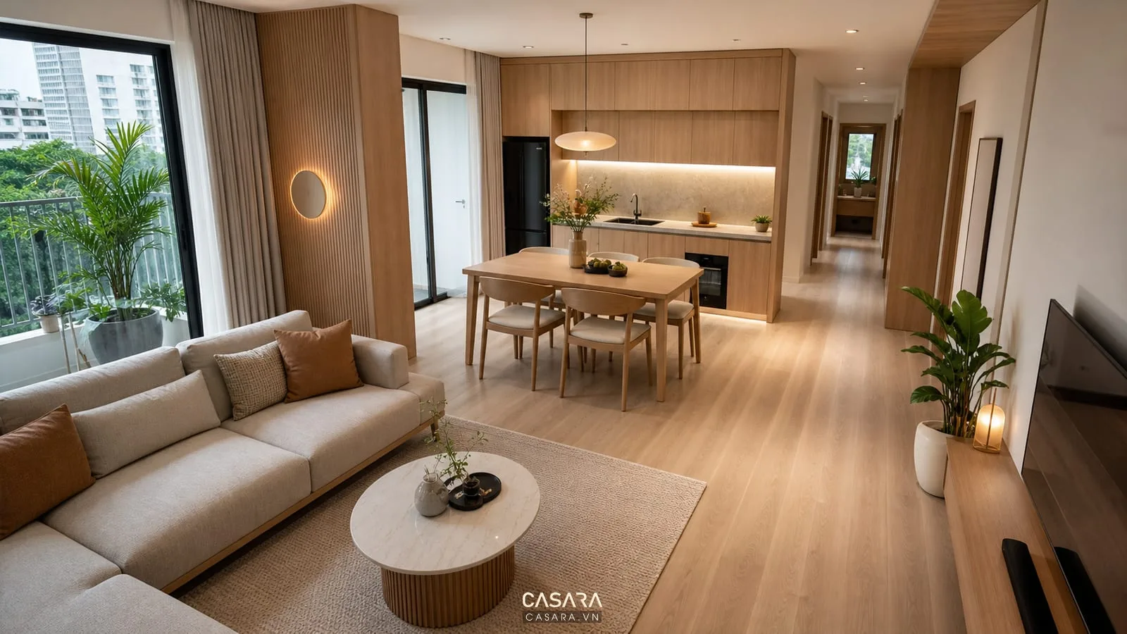 thiết kế nội thất căn hộ phòng khách bếp liên thông với sofa bàn ăn và tủ bếp gỗ sáng
