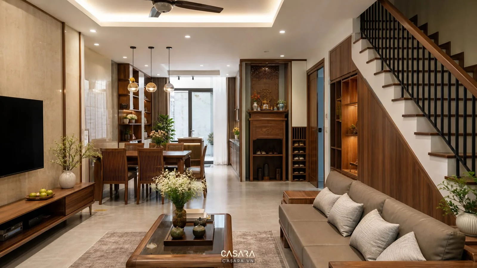 Thiết kế nội thất tại hà nội nhà phố có phòng khách cầu thang vách gỗ và giếng trời