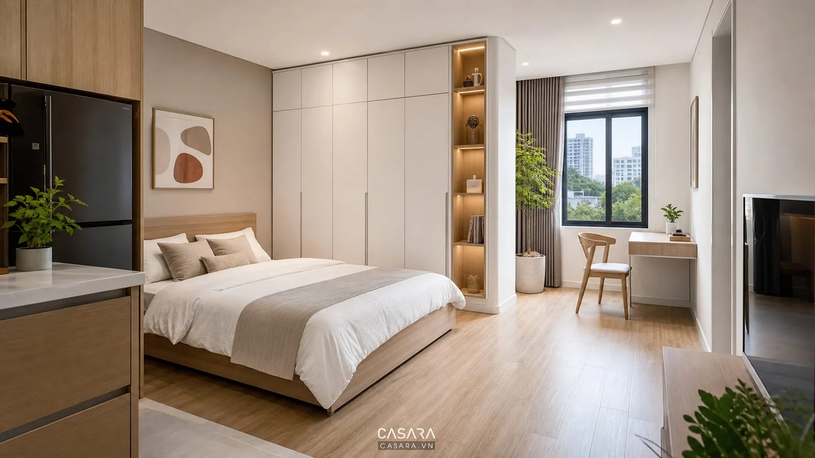 Căn hộ studio 25m2 bố trí giường sát tường và nội thất gỗ sáng màu