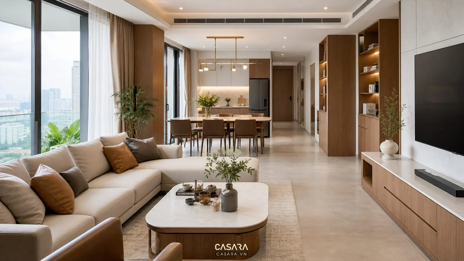 Phòng khách chung cư 70m2 có sofa kệ tivi bàn ăn và ánh sáng tự nhiên