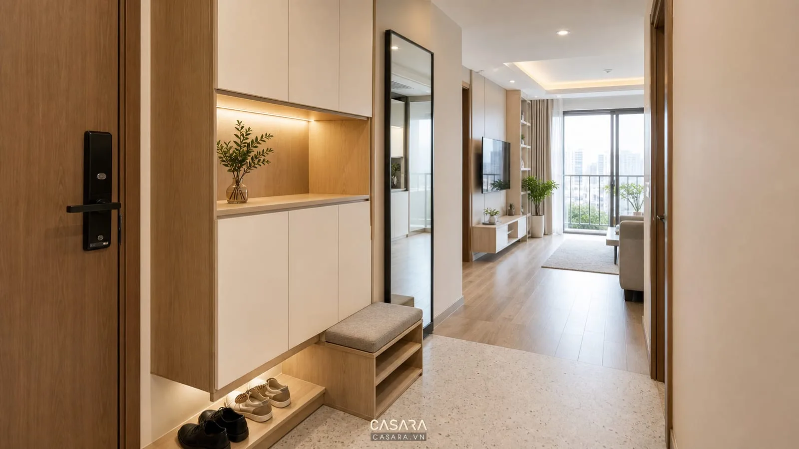 Tủ lưu trữ lối vào căn hộ 55m2 với tủ giày sát trần và gương lớn