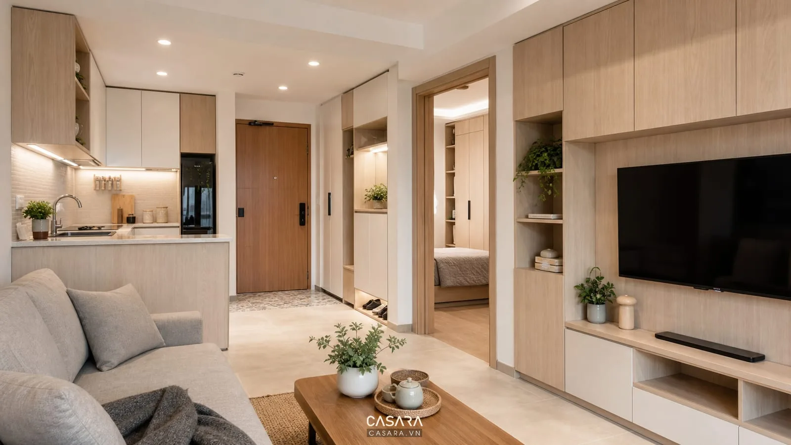 Thiết kế nội thất chung cư với hệ tủ bếp tủ tivi tủ giày và tủ quần áo gọn gàng