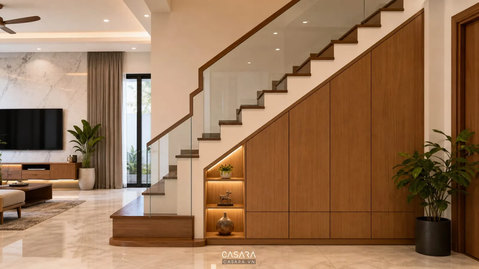 trang trí góc cầu thang đẹp bằng tủ âm gỗ và đèn hắt ấm