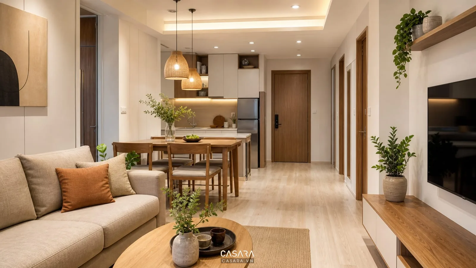 trang trí chung cư phòng khách liền bếp với bàn ăn và sofa hiện đại