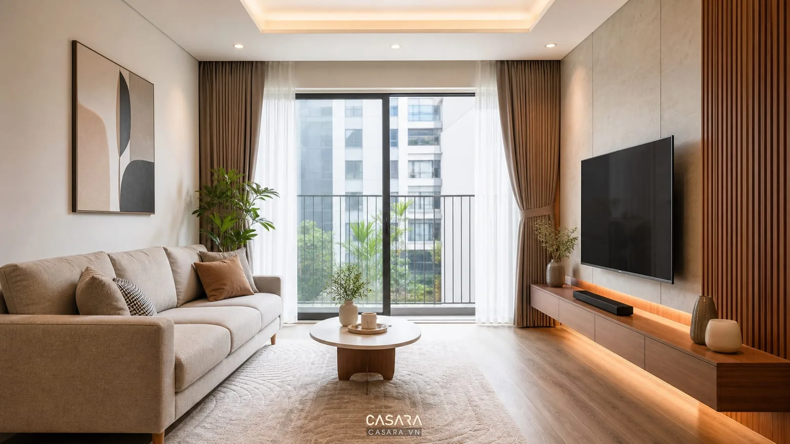 Phòng khách chung cư 70m2 có sofa thảm bàn trà và kệ tivi gỗ